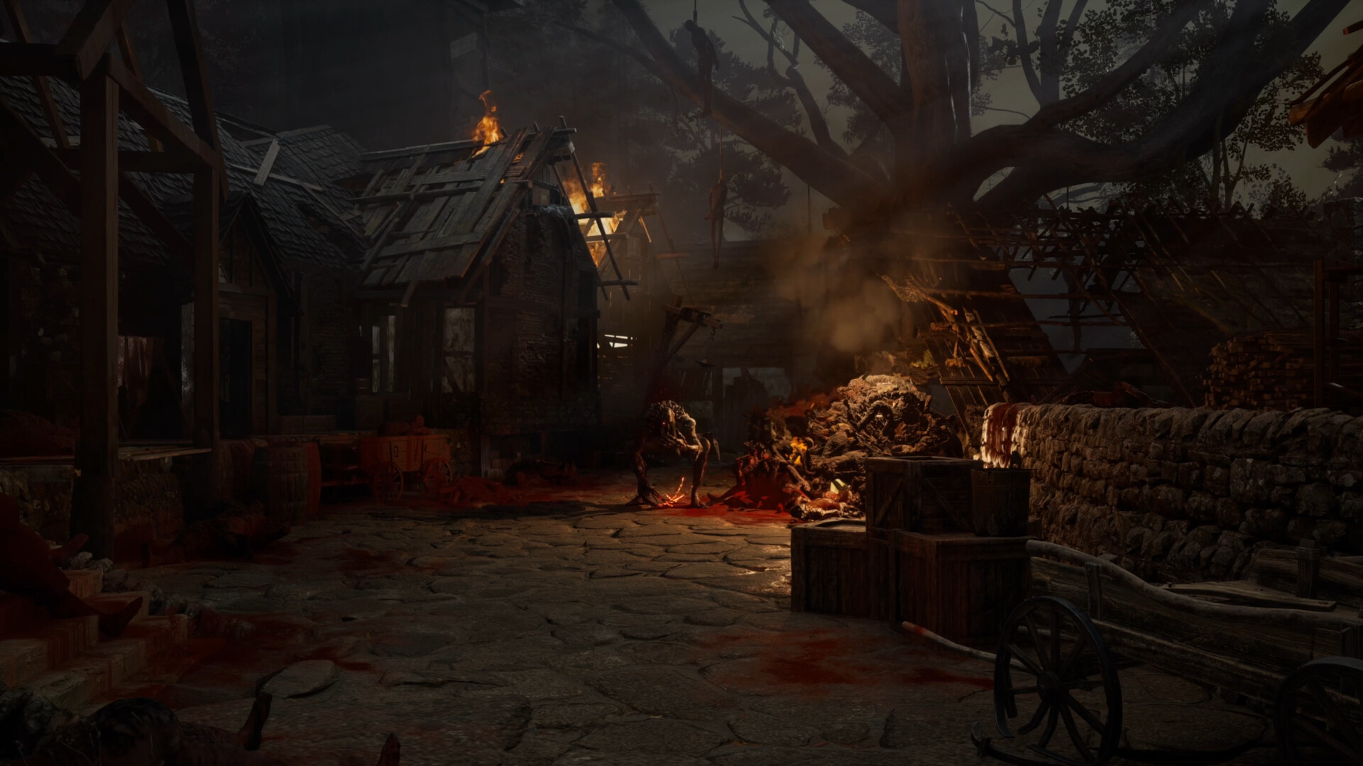 Fire and corruption glow beside buildings on a dark village street.